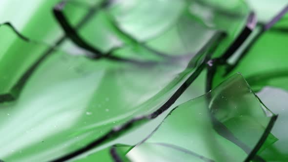 Shards of Green Glass Rotate in a Circle