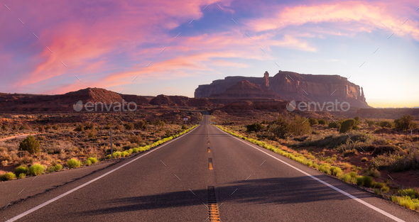 Scenic Road in the Dry Desert with Red Rocky Mountains in Background. - Stock Photo - Images