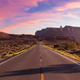 Scenic Road in the Dry Desert with Red Rocky Mountains in Background. - PhotoDune Item for Sale