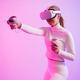 Female athlete in VR glasses practicing martial arts - PhotoDune Item for Sale