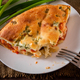 Homemade pie with chicken, herbs and tomatoes on a plate. - PhotoDune Item for Sale
