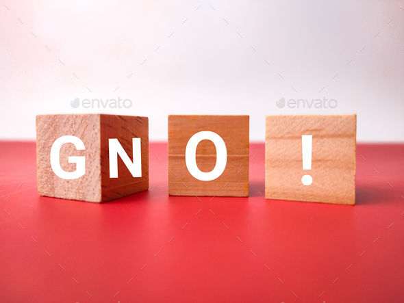 Wooden block with the word G N O on red and white background. - Stock Photo - Images