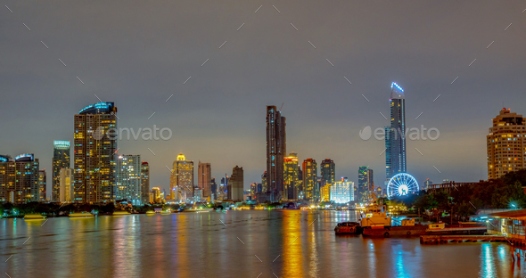 Cityscape of modern building near the river in the night. Modern architecture office building. - Stock Photo - Images