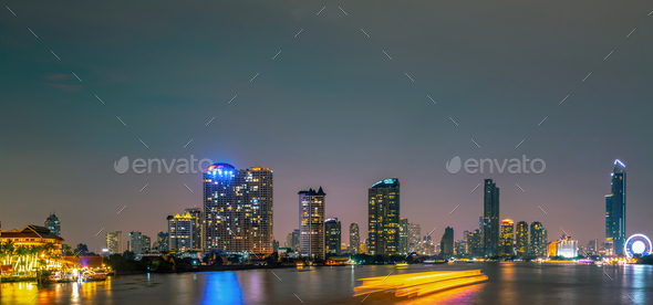 Cityscape of modern building near the river in the night. Modern architecture office building. Sky - Stock Photo - Images
