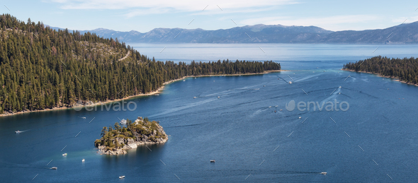 View of Large Bay and Lake with Boats, Small Island, Trees and Mountains. - Stock Photo - Images