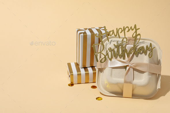 Concept of congratulation and celebration with bento cake in box