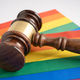 Gavel for judge lawyer on rainbow flag, symbol of LGBT pride month celebrate annual in June. - PhotoDune Item for Sale