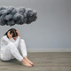 Unrecognizable woman with mental disorder and suicidal thoughts under a dark storm cloud - PhotoDune Item for Sale
