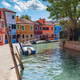 Burano, Italy with colorful painted houses along canal with boats - PhotoDune Item for Sale