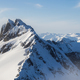 Rugged Canadian Mountain Peak Covered in Snow. Aerial Landscape - PhotoDune Item for Sale