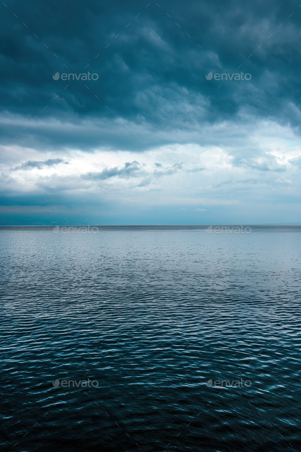 Adriatic sea water surface with dramatic sky - Stock Photo - Images
