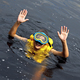 Happy young boy swimming in lake - PhotoDune Item for Sale