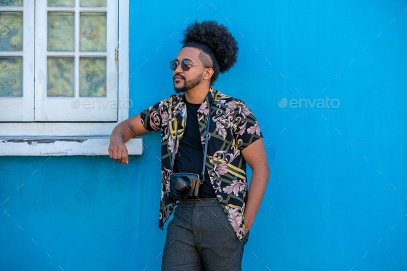 Portrait of stylish young man with afro - Stock Photo - Images