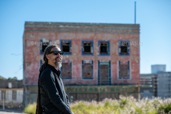 Portrait of man with sunglasses seen outdoors - Stock Photo - Images