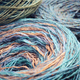 Round skeins of organic multi-coloured lambswool yarn. - PhotoDune Item for Sale