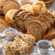 Assortment of different kind of cereal bakery - bread, pasties, buns, with healthy seeds - PhotoDune Item for Sale