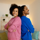 Joyful Black Spouses Standing Back To Back Posing At Home - PhotoDune Item for Sale