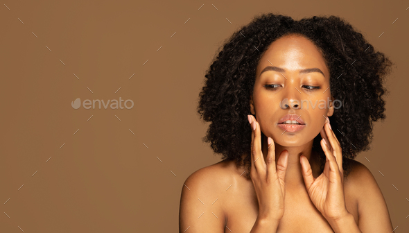 590px x 336px - Beautiful half-naked young black woman looking at copy space Stock Photo by  Prostock-studio