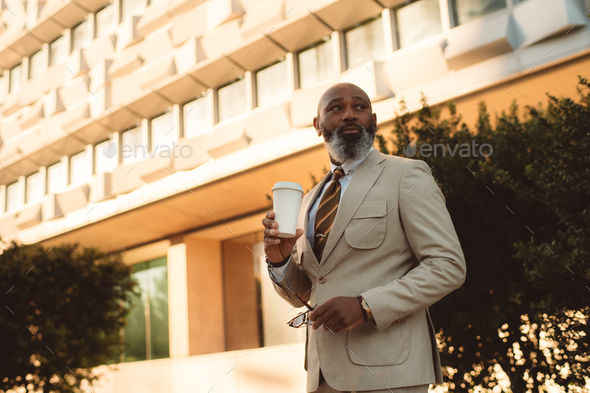 African Black man Sipping Coffee - Stock Photo - Images