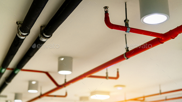 Automatic fire sprinkler safety system and black water cooling supply pipe. Fire Suppression. Fire - Stock Photo - Images