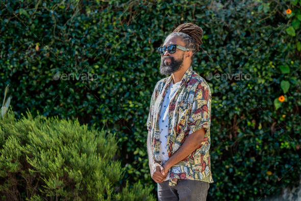 Portrait of stylish man seen outdoors - Stock Photo - Images
