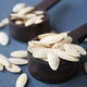 Dry Healthy organic Pumkin Seeds on wooden Spoon . - PhotoDune Item for Sale