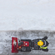 Worker cleaning snow on the sidewalk with a snowblower. Wintertime - PhotoDune Item for Sale