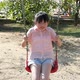 Cute Asian Girl Playing Swing In The Park - VideoHive Item for Sale