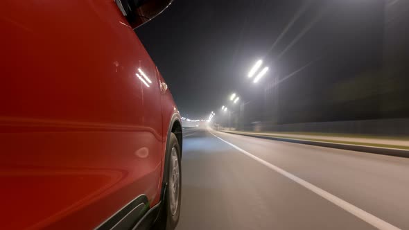 Drivelapse Urban Look From Fast Driving Car at a Night Avenue in a City Timelapse Hyperlapse alt
