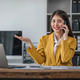 Young busy asian business woman talking on phone working in modern office. Asian businesswoman - PhotoDune Item for Sale