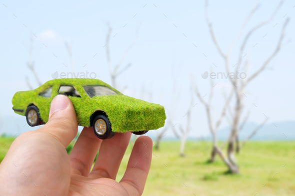 Hand Holding Eco car icon concept - Stock Photo - Images