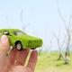 Hand Holding Eco car icon concept - PhotoDune Item for Sale