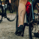 Unrecognizable woman cyclist having a bicycle chain mark on the leg - PhotoDune Item for Sale
