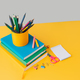 School supplies with books on yellow background - PhotoDune Item for Sale