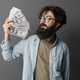 Handsome bearded man holds money in hand - PhotoDune Item for Sale