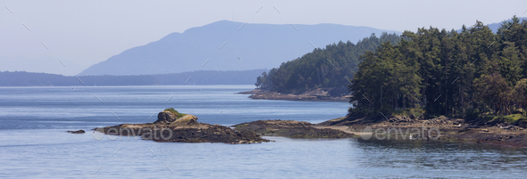 Rocky Shore on the West Coast of Pacific Ocean. Canadian Nature Background. - Stock Photo - Images