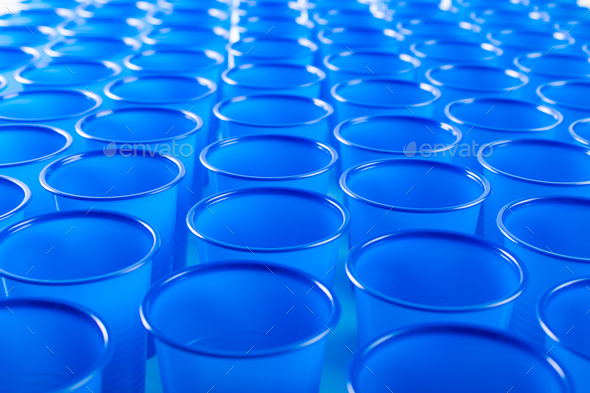 blue disposable plastic glasses - Stock Photo - Images