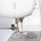 Modern White Sewing Machine Presser Foot Closeup, Macro - PhotoDune Item for Sale