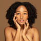 Sensual pretty topless young african woman touching her face - PhotoDune Item for Sale