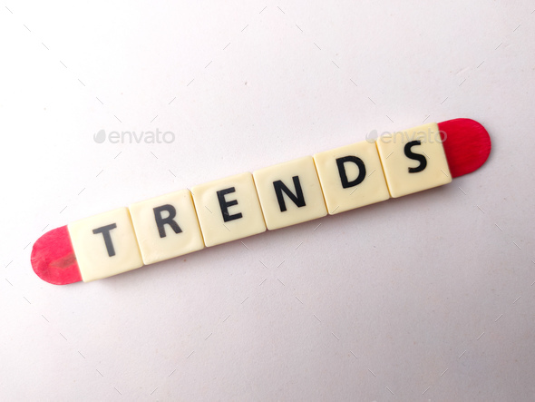 Toys word with the word TRENDS on a white background - Stock Photo - Images