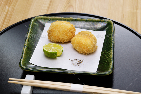 fried puffer fish milt, traditional Japanese cuisine - Stock Photo - Images