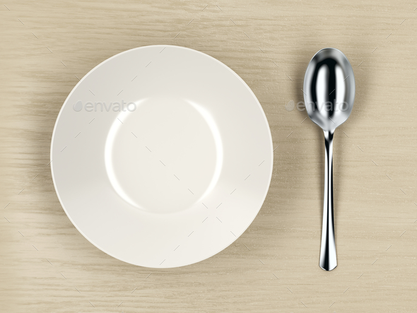 Empty soup bowl and silver spoon - Stock Photo - Images