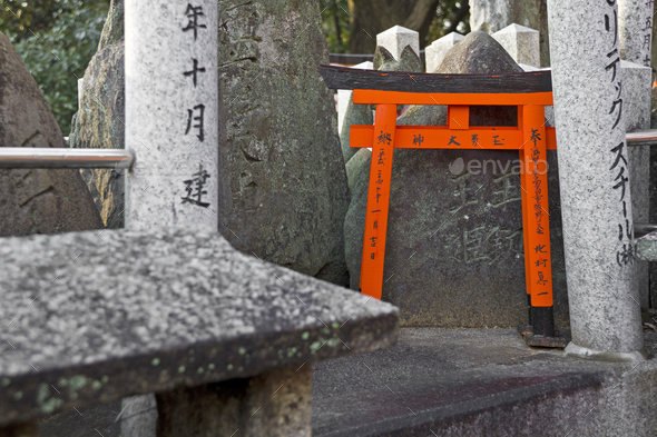 The small tori gate at Fushimi Inari Shrine in Kyoto - Stock Photo - Images
