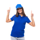 active young brunette woman promoter in blue t-shirt and cap on white background with copy space - PhotoDune Item for Sale