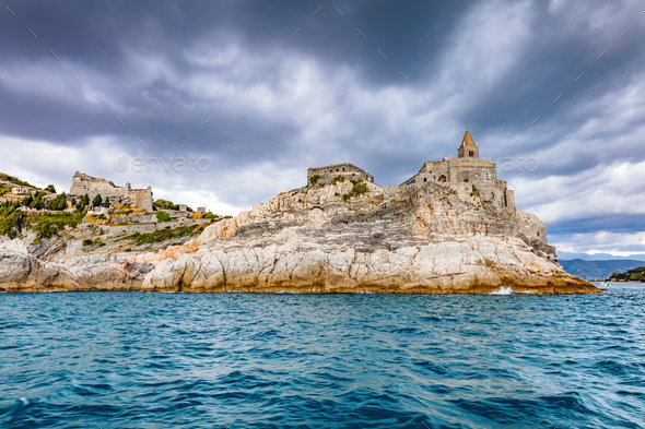 Porto Venere with Doria castle and St. Peter church in Italy - Stock Photo - Images