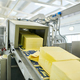 Roller conveyor with butter cubes - PhotoDune Item for Sale