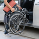Asian disability woman on wheelchair getting in her car, Accessibility concept. - PhotoDune Item for Sale