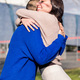 couple of two young women hugging happy - PhotoDune Item for Sale
