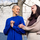 lesbian couple laughing happy in a romantic walk - PhotoDune Item for Sale