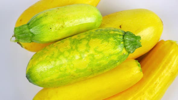 Zucchini vegetables rotate in a circle.  alt